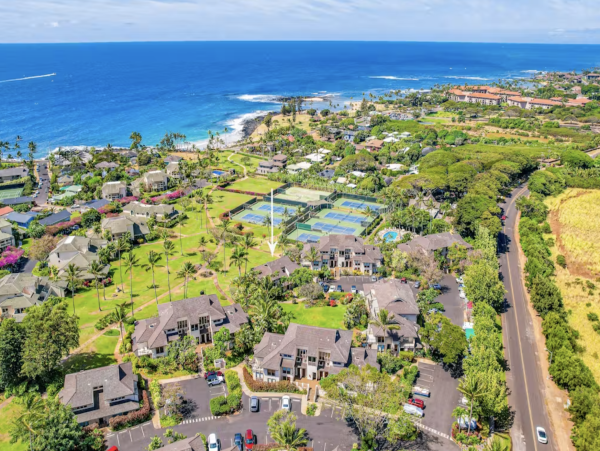 Luxury Poipu Kauai Vacation Rental  Ocean View Top-Floor Condo Near Brennecke’s Beach